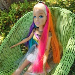 Hi Barbie 👋,  This Rainbow 28" Rainbow Sparkle Barbie 🌈